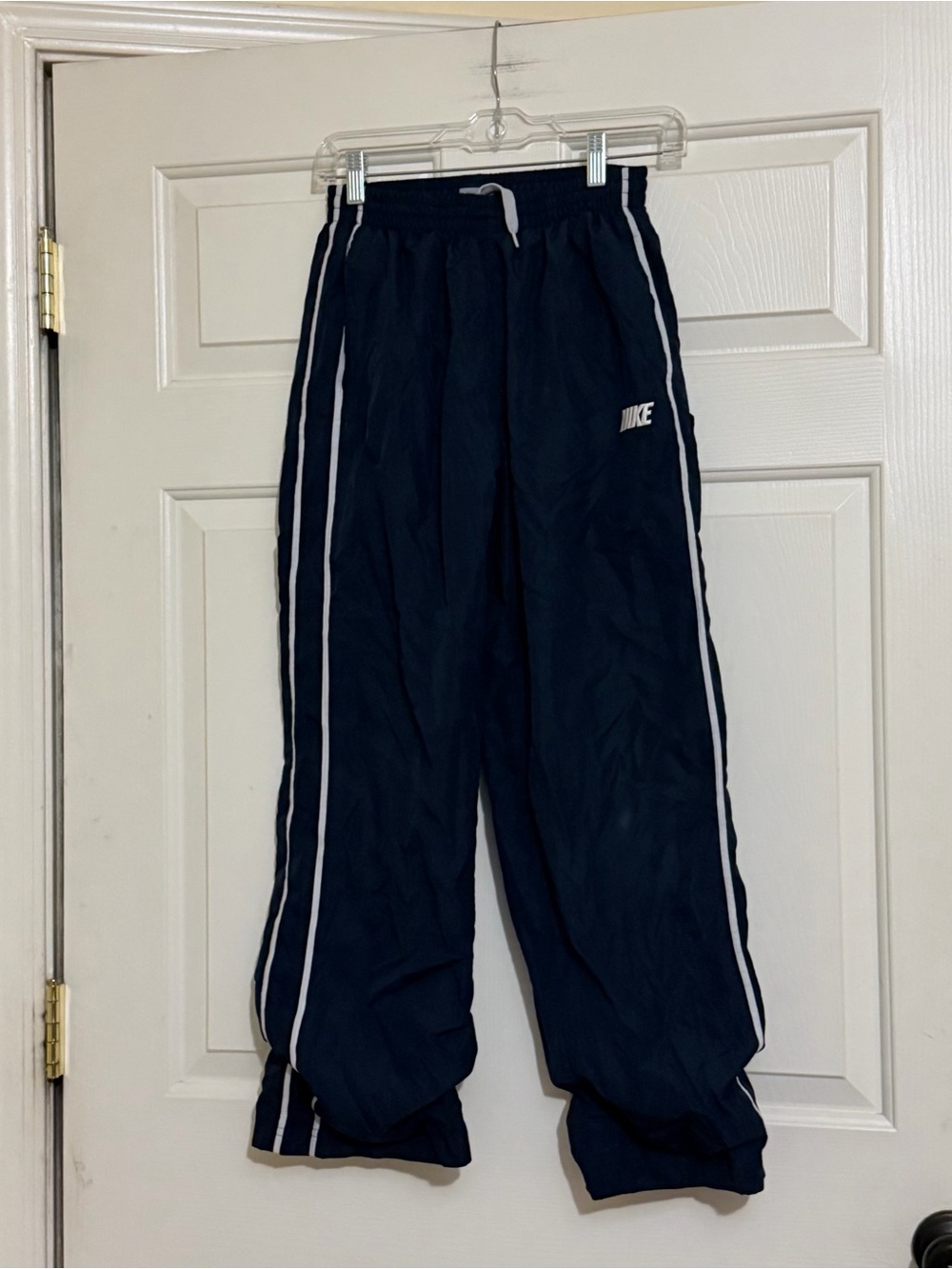 Nike Kids Navy Track Pants with White Piping SpellOut Logo Size XL